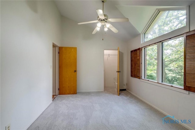 4146 Northmoor Rd, Ottawa Hills, OH 43606 - unfurnished bedroom featuring carpet flooring, a closet, high vaulted ceiling, and a ceiling fan