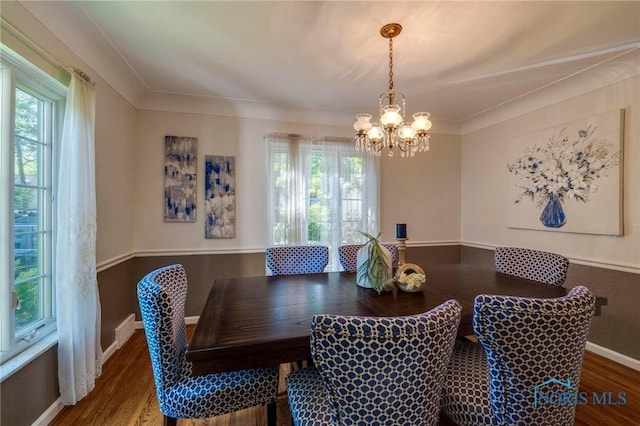 4146 Northmoor Rd, Ottawa Hills, OH 43606 - dining room featuring a chandelier and wood finished floors