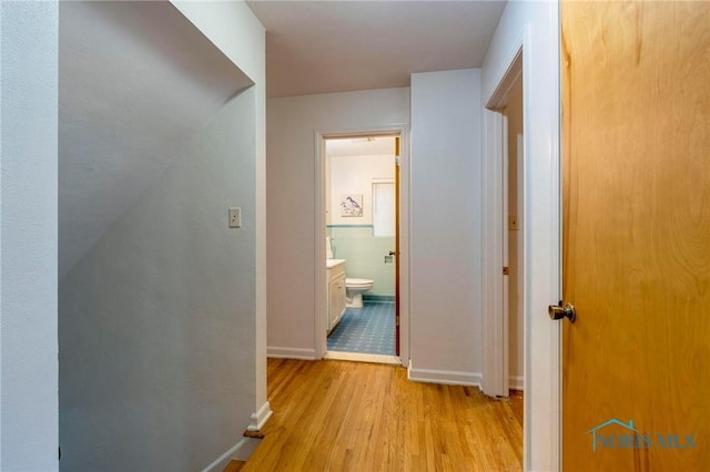 4146 Northmoor Rd, Ottawa Hills, OH 43606 - hall with light wood-style floors and baseboards