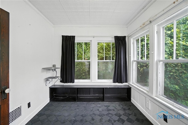 1452 Rollins Rd, Toledo, OH 43612 - unfurnished sunroom with crown molding and an ornate ceiling