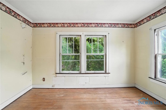 1452 Rollins Rd, Toledo, OH 43612 - empty room with wood finished floors and baseboards