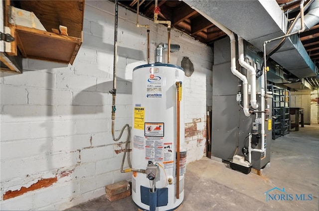 1452 Rollins Rd, Toledo, OH 43612 - utility room with water heater and heating unit