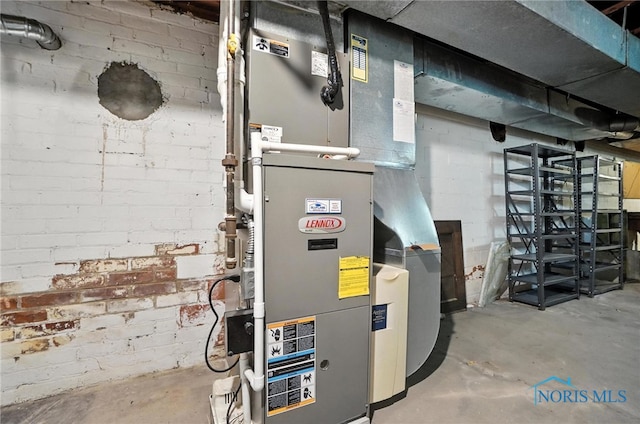 1452 Rollins Rd, Toledo, OH 43612 - utility room with heating unit
