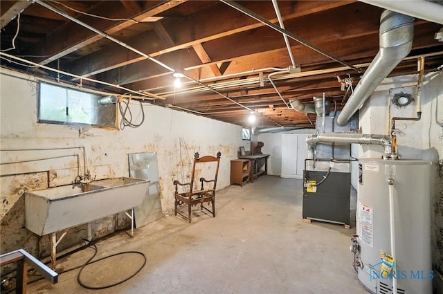 1452 Rollins Rd, Toledo, OH 43612 - below grade area featuring gas water heater and a sink