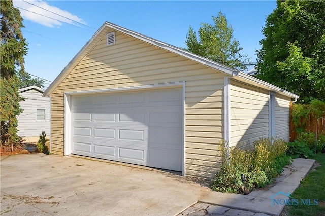 301 S High St, Pandora, OH 45877 - detached garage featuring concrete driveway