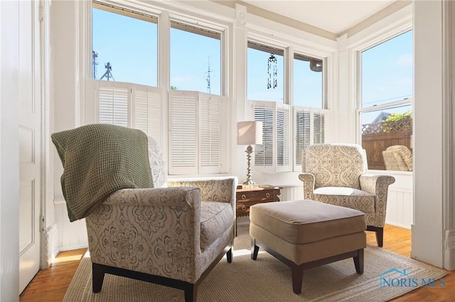 301 S High St, Pandora, OH 45877 - sitting room with wood finished floors and healthy amount of natural light