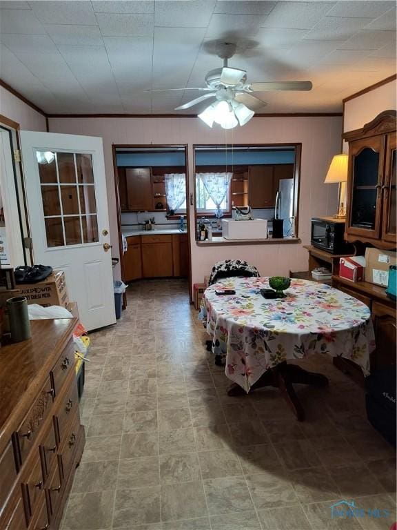 10 Edgewater, Toledo, OH 43611 - dining area with a ceiling fan and crown molding
