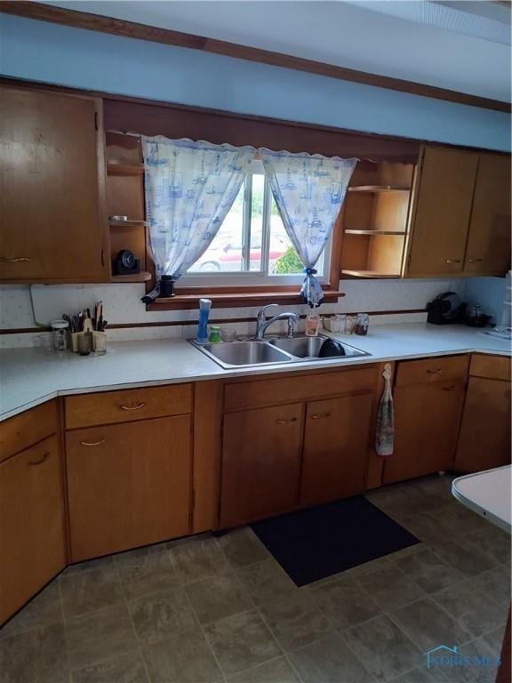 10 Edgewater, Toledo, OH 43611 - kitchen with open shelves, light countertops, and brown cabinetry