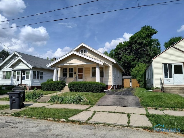 3906 Watson Ave, Toledo, OH 43612 - bungalow with covered porch and asphalt driveway