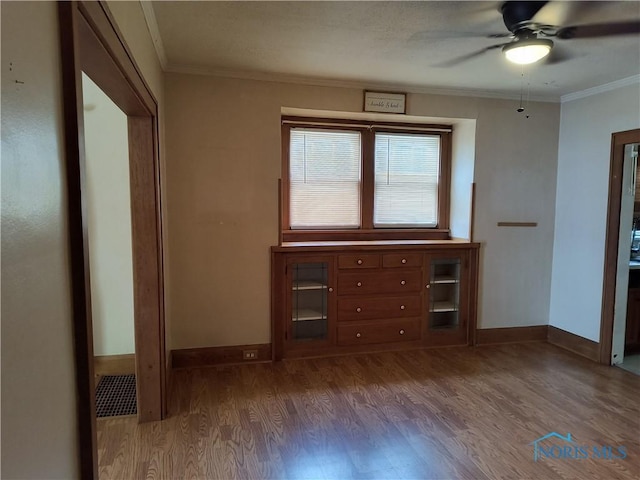 3906 Watson Ave, Toledo, OH 43612 - unfurnished room featuring wood finished floors, a ceiling fan, and ornamental molding