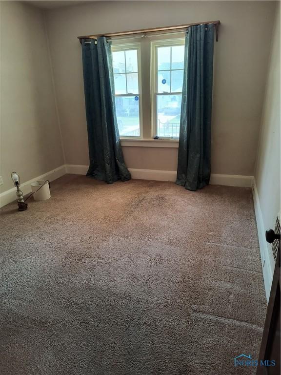 3906 Watson Ave, Toledo, OH 43612 - carpeted empty room featuring baseboards