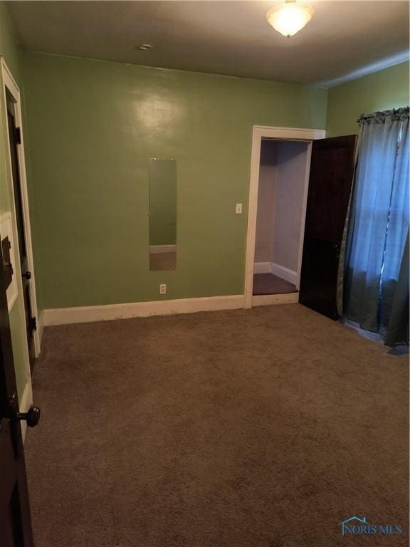 3906 Watson Ave, Toledo, OH 43612 - unfurnished bedroom featuring carpet floors and baseboards