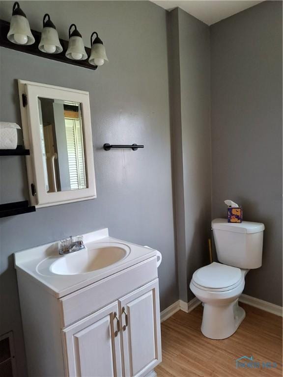3906 Watson Ave, Toledo, OH 43612 - bathroom featuring vanity and wood finished floors