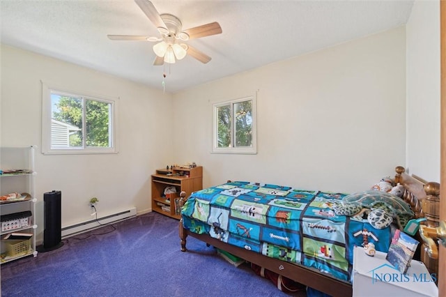 17918 Dunbridge Rd, Bowling Green, OH 43402 - carpeted bedroom featuring a baseboard heating unit and ceiling fan