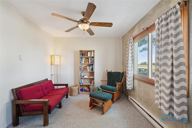 17918 Dunbridge Rd, Bowling Green, OH 43402 - living area with baseboard heating, carpet, and a ceiling fan