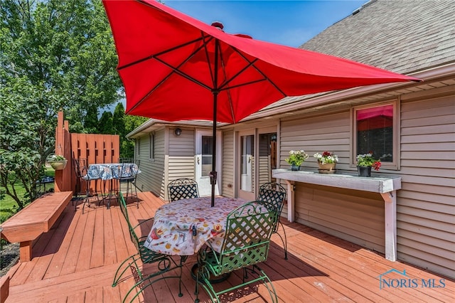 625 W Lake Ct Unit U5, Findlay, OH 45840 - wooden deck featuring outdoor dining space