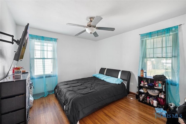 721 Colima Dr, Toledo, OH 43609 - bedroom with wood finished floors and a ceiling fan