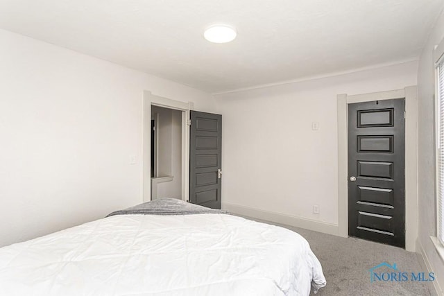 3947 Burnham Ave, Toledo, OH 43612 - bedroom featuring carpet and baseboards