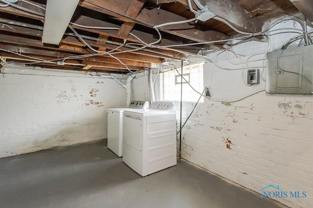 3947 Burnham Ave, Toledo, OH 43612 - basement featuring electric panel and washing machine and dryer