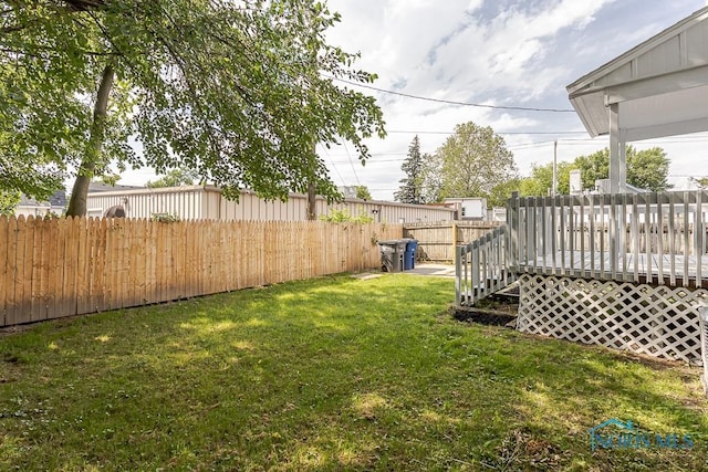3947 Burnham Ave, Toledo, OH 43612 - fenced backyard with a deck
