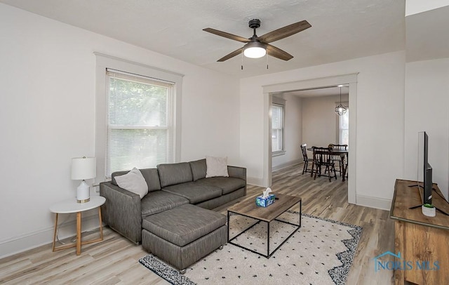 3947 Burnham Ave, Toledo, OH 43612 - living room featuring wood finished floors and a ceiling fan