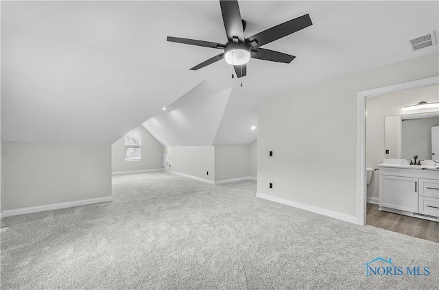 9414 Sheffield Rd, Perrysburg, OH 43551 - bonus room with carpet flooring, ceiling fan, and vaulted ceiling