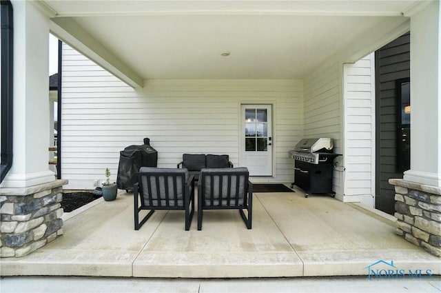 4214 Thornbury Ct, Perrysburg, OH 43551 - view of patio with area for grilling and an outdoor living space