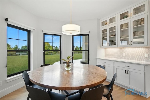 4214 Thornbury Ct, Perrysburg, OH 43551 - dining room with light wood-style flooring