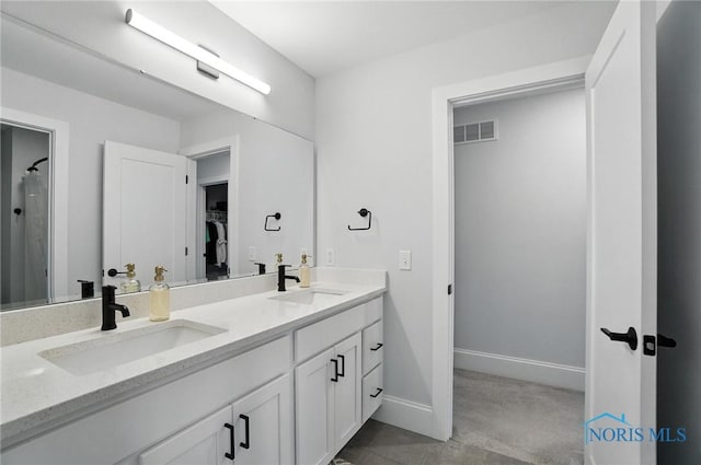 4214 Thornbury Ct, Perrysburg, OH 43551 - full bath with double vanity, a walk in closet, and a shower