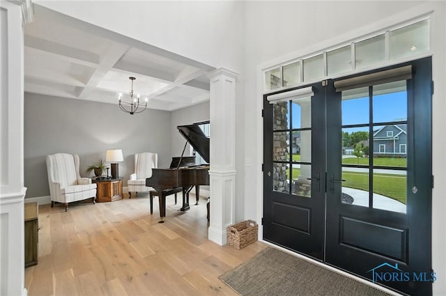 4214 Thornbury Ct, Perrysburg, OH 43551 - entryway with decorative columns, coffered ceiling, beam ceiling, light wood-type flooring, and french doors