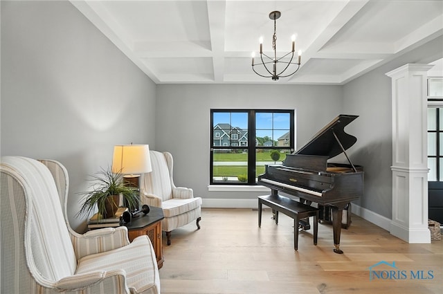 4214 Thornbury Ct, Perrysburg, OH 43551 - living area featuring coffered ceiling, a chandelier, light wood-style flooring, beam ceiling, and ornate columns