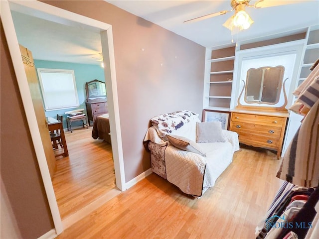 1925 Harlan Rd, Toledo, OH 43615 - living area with a ceiling fan and light wood-style floors