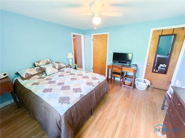 1925 Harlan Rd, Toledo, OH 43615 - bedroom with light wood-style floors and a ceiling fan