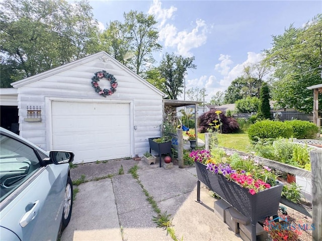 1925 Harlan Rd, Toledo, OH 43615 - detached garage featuring driveway