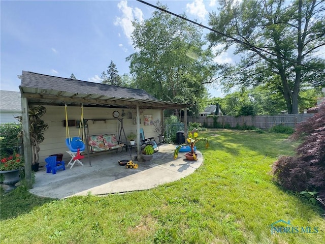 1925 Harlan Rd, Toledo, OH 43615 - view of yard featuring a patio