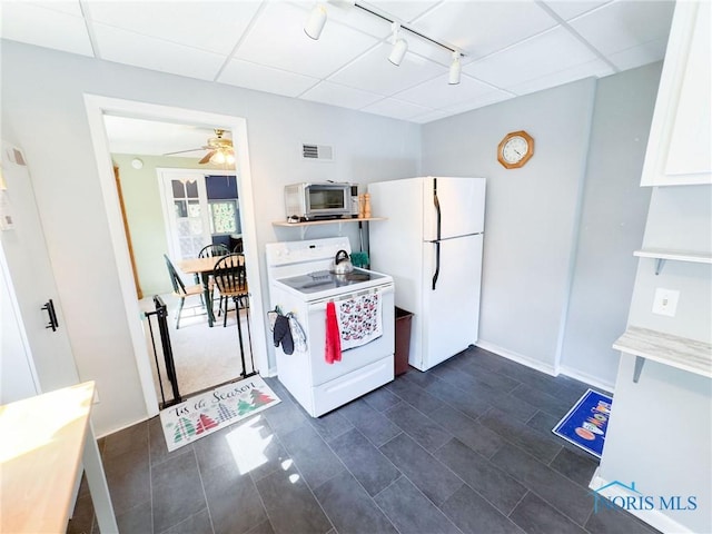 1925 Harlan Rd, Toledo, OH 43615 - kitchen with white appliances, rail lighting, white cabinetry, light countertops, and ceiling fan