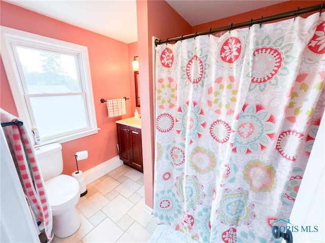 1925 Harlan Rd, Toledo, OH 43615 - bathroom with vanity, a shower with curtain, and tile patterned flooring