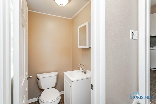 1831 Evansdale Ave, Toledo, OH 43607 - half bathroom featuring toilet and vanity