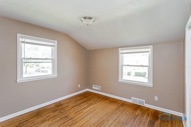 1831 Evansdale Ave, Toledo, OH 43607 - additional living space with lofted ceiling and wood finished floors