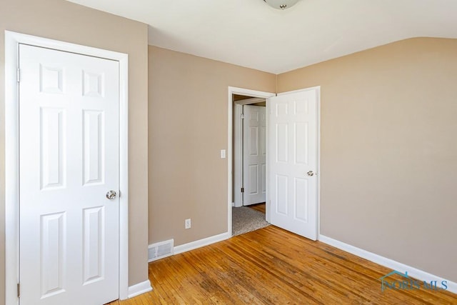 1831 Evansdale Ave, Toledo, OH 43607 - unfurnished bedroom featuring baseboards and light wood-style flooring