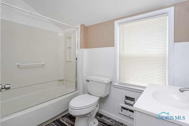 1831 Evansdale Ave, Toledo, OH 43607 - full bath featuring tile walls, washtub / shower combination, and vanity