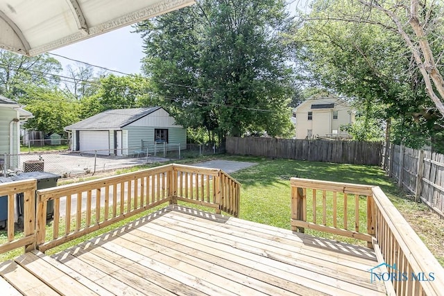 1831 Evansdale Ave, Toledo, OH 43607 - wooden terrace with a detached garage, a fenced backyard, and area for grilling
