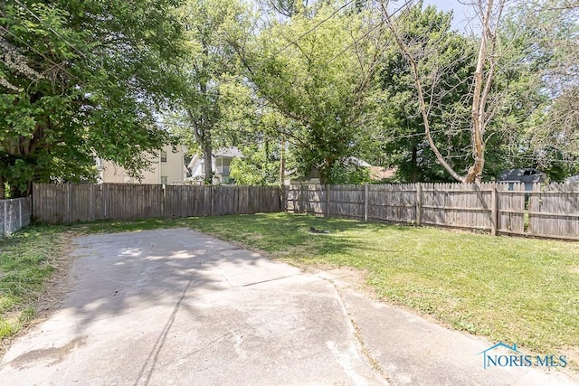 1831 Evansdale Ave, Toledo, OH 43607 - fenced backyard featuring a patio area