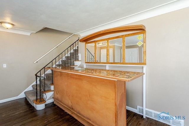1831 Evansdale Ave, Toledo, OH 43607 - bar with wood finished floors, stairs, and arched walkways