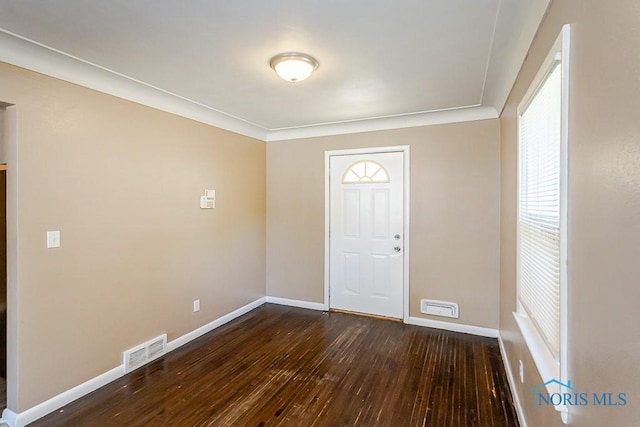 1831 Evansdale Ave, Toledo, OH 43607 - entryway featuring dark wood finished floors and crown molding