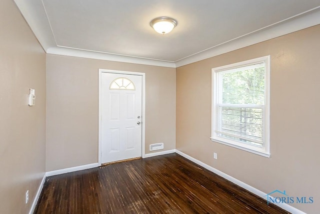 1831 Evansdale Ave, Toledo, OH 43607 - spare room featuring baseboards and dark wood finished floors