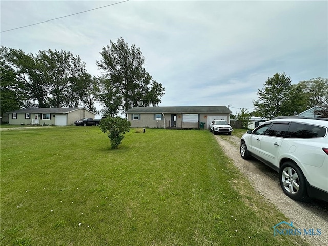 10889 Nelson Rd, Bowling Green, OH 43402 - ranch-style house featuring a front yard
