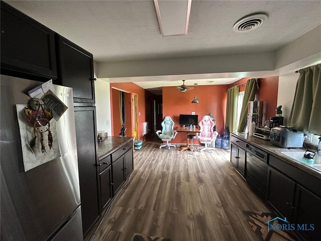 10889 Nelson Rd, Bowling Green, OH 43402 - kitchen featuring freestanding refrigerator, dark cabinetry, dark wood finished floors, and an office area