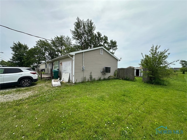 10889 Nelson Rd, Bowling Green, OH 43402 - view of side of property with a yard and an outbuilding