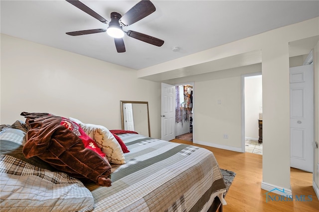 6961 Convent Blvd, Sylvania, OH 43560 - bedroom with light wood-style flooring and a ceiling fan
